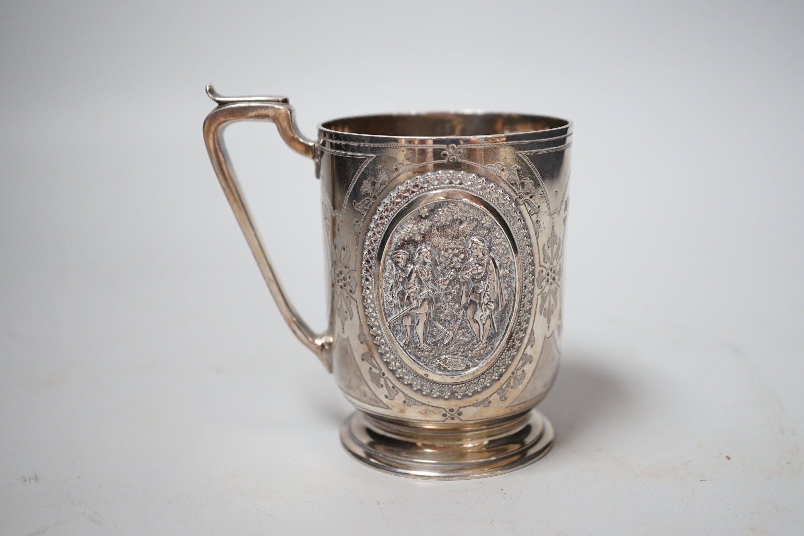 A Victorian silver christening can, with embossed panels, William & John Barnard, London, 1878, 92mm, 5.4oz.